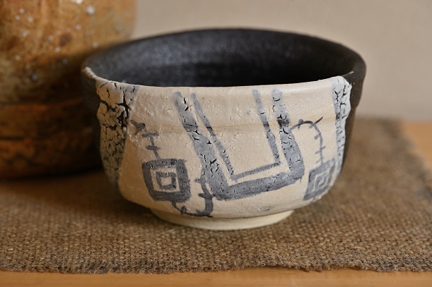鳴子文の黒織部茶碗