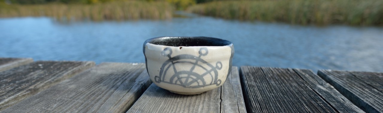 水車文黒織部茶碗